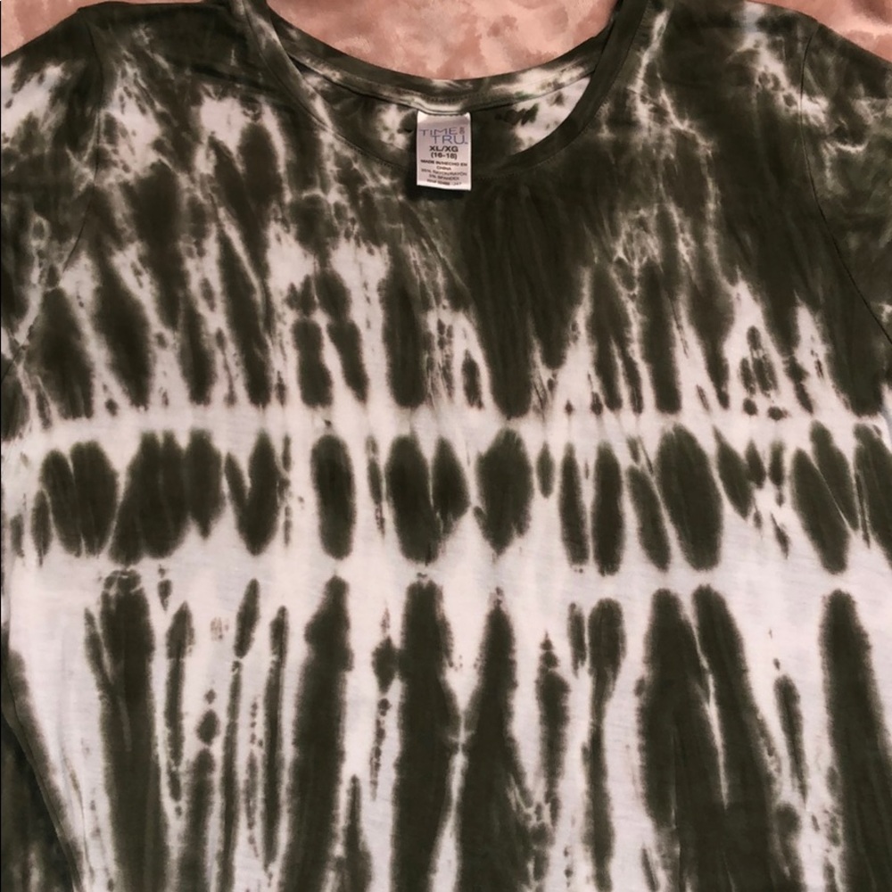 Green tie dye shirt that is tied in the front.